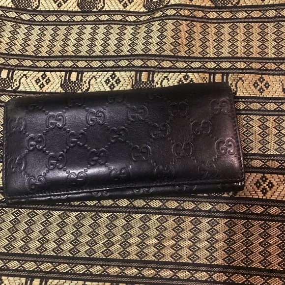 Authentic women´s black canvas guccisima bifold long...